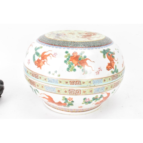 219 - Two Chinese famille rose circular formed lidded boxes, early 20th century, decorated in polychrome e... 