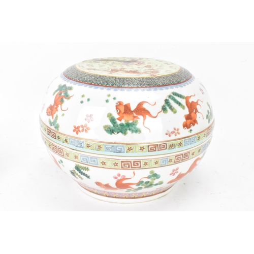 219 - Two Chinese famille rose circular formed lidded boxes, early 20th century, decorated in polychrome e... 