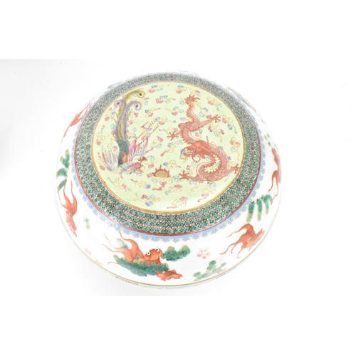 219 - Two Chinese famille rose circular formed lidded boxes, early 20th century, decorated in polychrome e... 