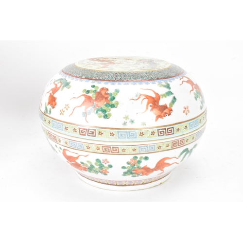 219 - Two Chinese famille rose circular formed lidded boxes, early 20th century, decorated in polychrome e... 