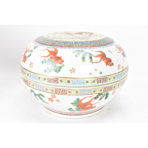 219 - Two Chinese famille rose circular formed lidded boxes, early 20th century, decorated in polychrome e... 