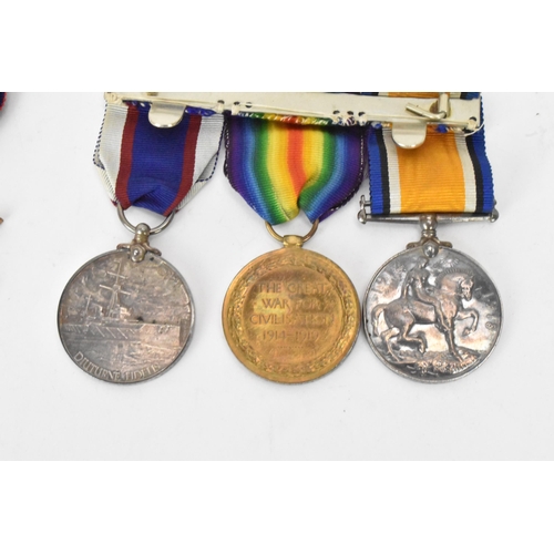 222 - A group of WWI and WWII medals to include a three medal WW1 group including a Royal fleet reserve lo... 