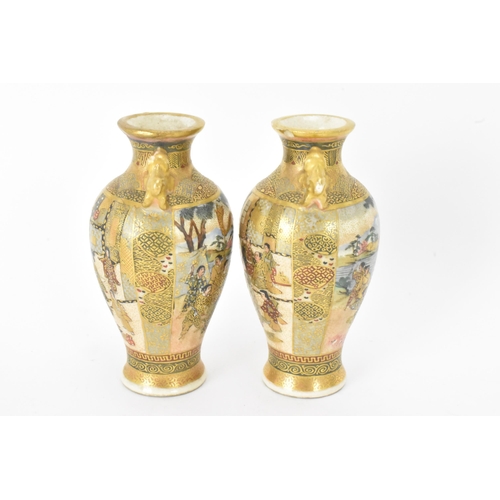 23 - A pair of Japanese Meiji Satsuma miniature vases and a later example, the pair of tapered form, the ... 