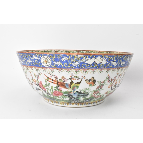 27 - A near pair of Chinese export Canton famille rose punch bowls, Qing dynasty, late 19th century, the ... 