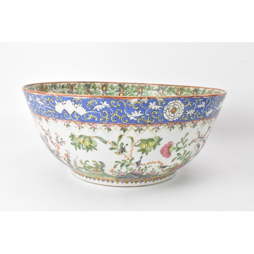 27 - A near pair of Chinese export Canton famille rose punch bowls, Qing dynasty, late 19th century, the ... 