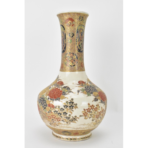 3 - A Japanese Meiji Satsuma bottle formed vase, having all over floral decoration within gilt bands and... 