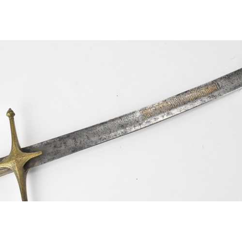 30 - An Ottoman Empire shamshir sword, having a curved blade with gilt calligraphy, characteristic gilt b... 