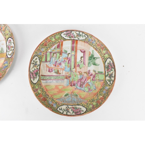 36 - A set of four Chinese export Canton Famille Rose plates, Qing Dynasty, late 19th century, each decor... 