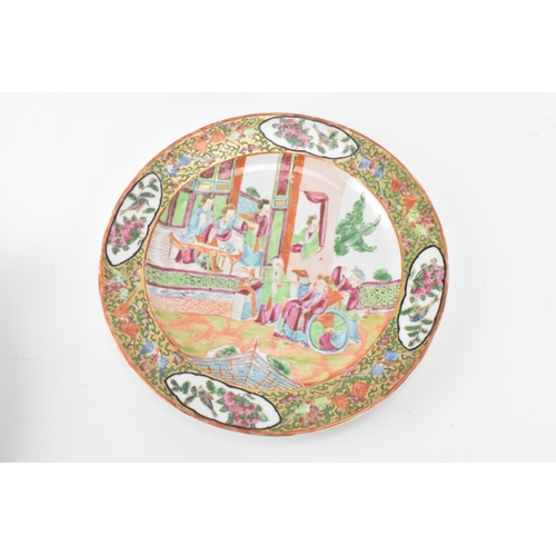 36 - A set of four Chinese export Canton Famille Rose plates, Qing Dynasty, late 19th century, each decor... 