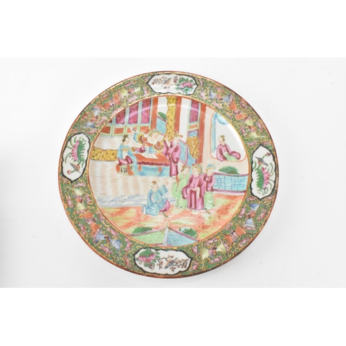 36 - A set of four Chinese export Canton Famille Rose plates, Qing Dynasty, late 19th century, each decor... 