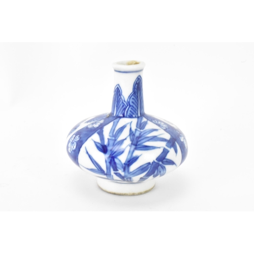 40 - A Chinese miniature vase, Kangxi period (1660-1722) of squat baluster shape decorated in blue and wh... 