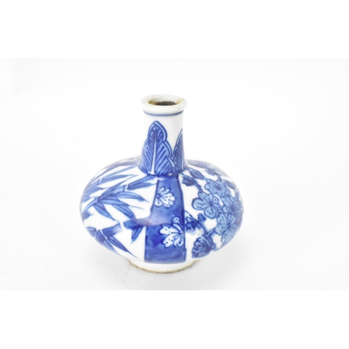 40 - A Chinese miniature vase, Kangxi period (1660-1722) of squat baluster shape decorated in blue and wh... 