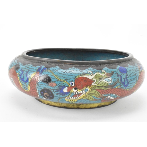 44 - A  Chinese cloisonne bowl, late 19th/early 20th century, of shallow form, decorated on a blue ground... 