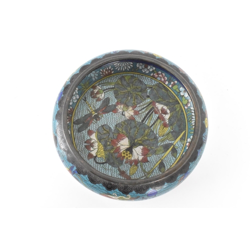 44 - A  Chinese cloisonne bowl, late 19th/early 20th century, of shallow form, decorated on a blue ground... 