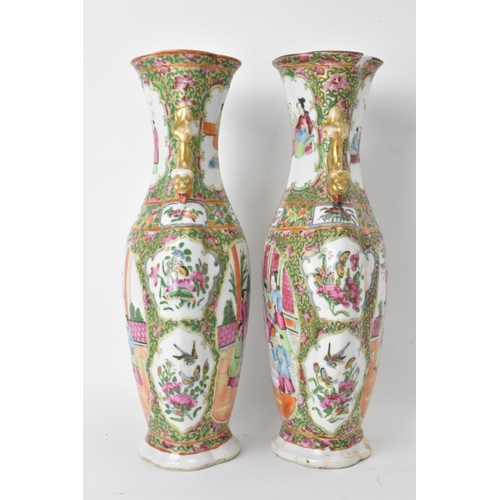 49 - A pair of Chinese export Canton Famille Rose vases, Qing Dynasty, late 19th century, in polychrome e... 