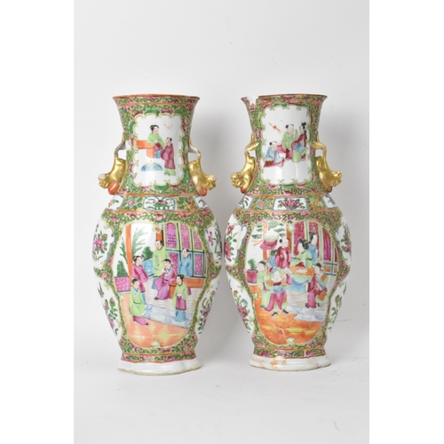 49 - A pair of Chinese export Canton Famille Rose vases, Qing Dynasty, late 19th century, in polychrome e... 