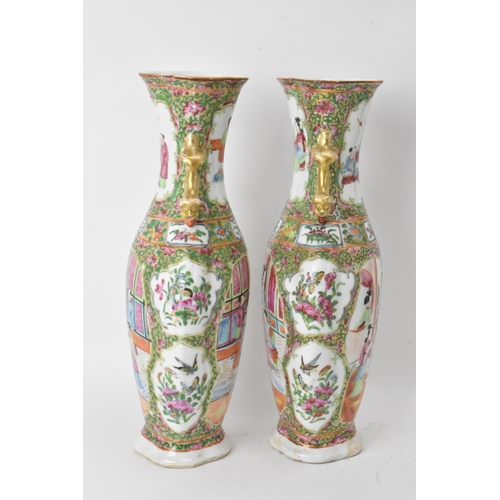 49 - A pair of Chinese export Canton Famille Rose vases, Qing Dynasty, late 19th century, in polychrome e... 