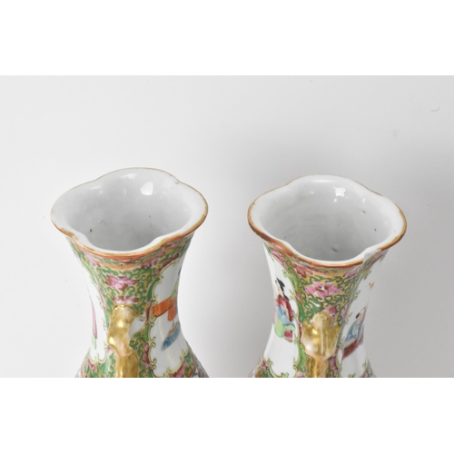 49 - A pair of Chinese export Canton Famille Rose vases, Qing Dynasty, late 19th century, in polychrome e... 