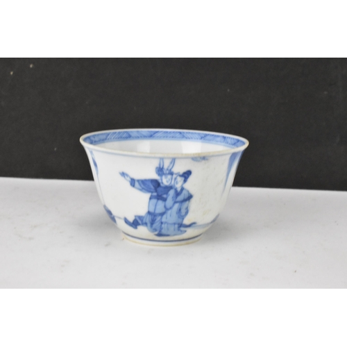 53 - Three Chinese 20th century blue and white bowls, decorated with dragons and interiors with central m... 