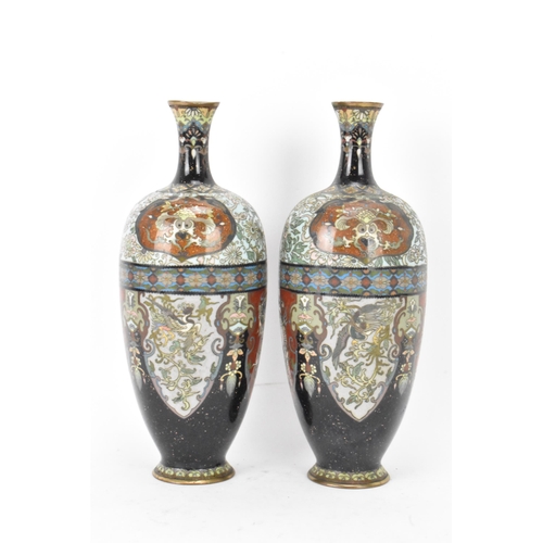 61 - A pair of Japanese Meiji period cloisonne enamel vases, of ovoid form with elongated necks, decorate... 