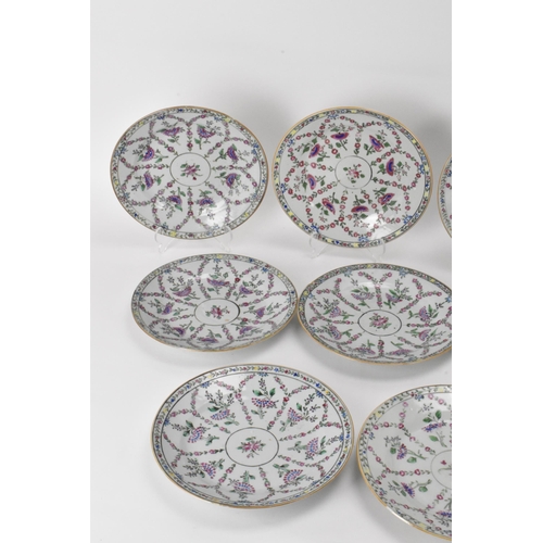 8 - A set of twelve Chinese Qing dynasty famille rose plates, 18th century, having central flower enclos... 