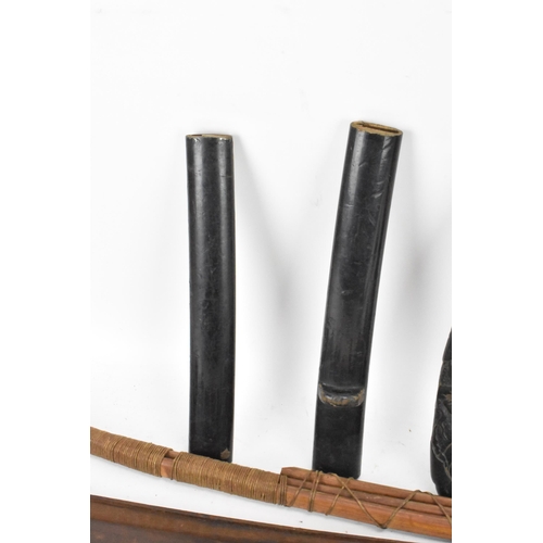 87 - A selection of Japanese items to include a bamboo bow, bound in string and incised with two characte... 