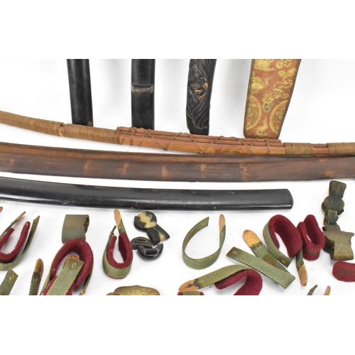 87 - A selection of Japanese items to include a bamboo bow, bound in string and incised with two characte... 