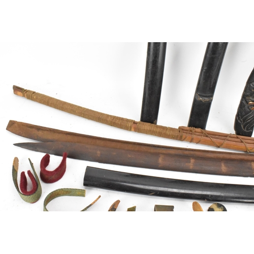 87 - A selection of Japanese items to include a bamboo bow, bound in string and incised with two characte... 