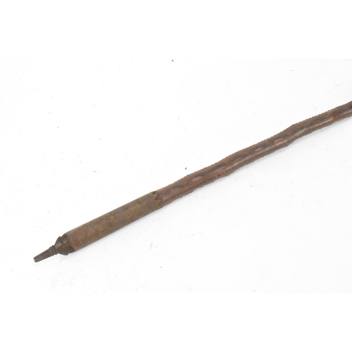 88 - An early 20th Century Southwestern European traditional Basque Makila walking cane, having a circula... 