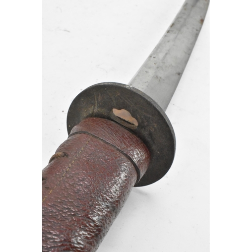 96 - A WWII Japanese officers Katana sword and scabbard, both bound in red leather, steel blade, pierced ... 