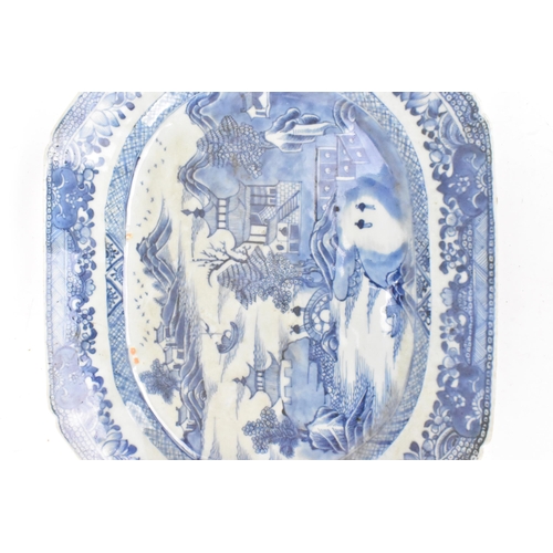 98 - A Chinese export, 18th century, Qianlong period blue and white meat plate, of canted form depicting ... 