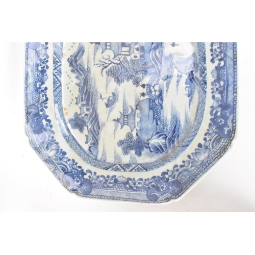 98 - A Chinese export, 18th century, Qianlong period blue and white meat plate, of canted form depicting ... 