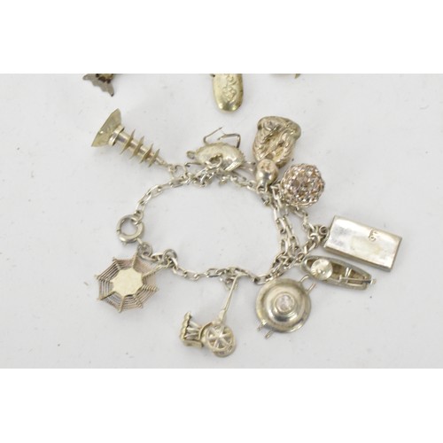 225 - Chinese silver jewellery to include a necklace, two charm bracelets and a bar brooch, all with vario... 