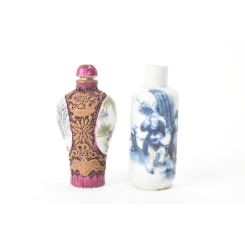 228 - Two Chinese porcelain hand painted snuff bottles to include a Qing dynasty blue and white bottle dec... 