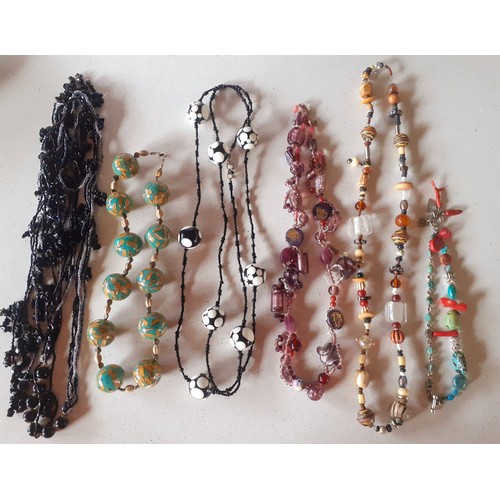 45 - Four 1980's colourful 'sweetie' resin necklaces, 2 signed Sobral (Carlos Sobral, Brazil), a 'sweetie... 