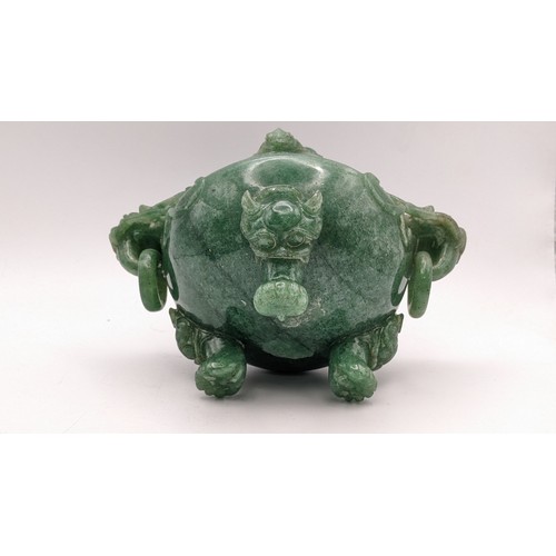 30A - A 20th century Chinese jade censor, the lid decorated with a coiled dragon and handles with dragon h... 