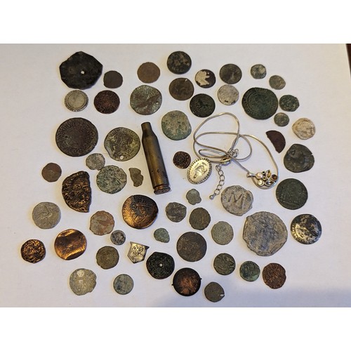 82 - Metal Detector Finds - A collection of mixed finds and artifacts to include brooches, silver rings a... 