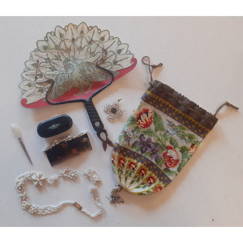 A circa 1900-1940's Indonesian fan made of water buffalo hide and horn together with a late 19th Century Victorian beaded reticule with draw-string fastening and beaded tassel below, a small ebony snuff box with mother of pearl inlay and a small quantity of seed pearl jewellery A/F to include a pendant on gold tone clasp with central smoky glass hair locket. Location:
If there is no condition report shown, please request