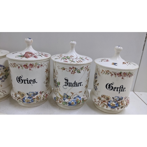 34 - A group of late 19th century German kitchen jars, together with a flour jar circa 1900
Location: 2:2... 