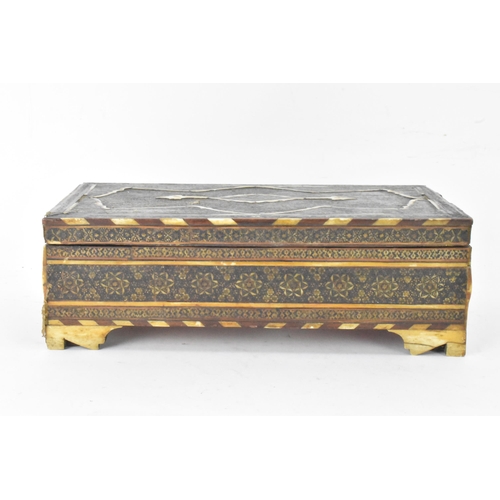 431 - A Persian late Qajar dynasty box, of rectangular form, profusely inlaid with micro-mosaic inlaid for... 