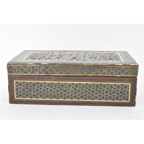 432 - A late 19th century Indo-Persian cigarette box, decorated with a silver repousse panel to the lid de... 