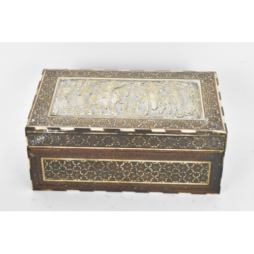 433 - A late 19th century Indo-Persian katamkari cigarette box, decorated with a silver repousse panel to ... 