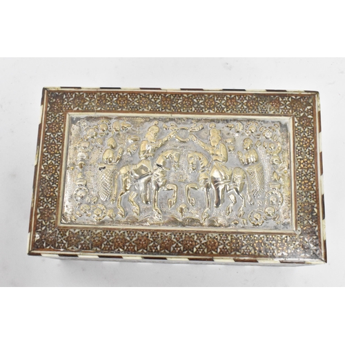 433 - A late 19th century Indo-Persian katamkari cigarette box, decorated with a silver repousse panel to ... 