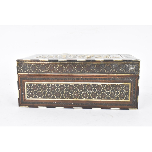 433 - A late 19th century Indo-Persian katamkari cigarette box, decorated with a silver repousse panel to ... 