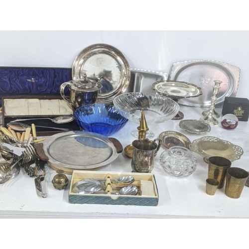 446 - A mixed lot to include cutlery, Selkirk glass paperweight, silver plated tea pot and other items
Loc... 