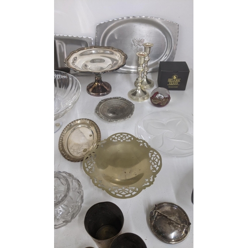 446 - A mixed lot to include cutlery, Selkirk glass paperweight, silver plated tea pot and other items
Loc... 