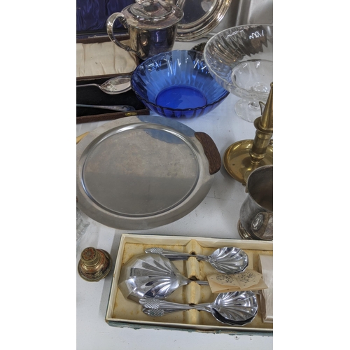 446 - A mixed lot to include cutlery, Selkirk glass paperweight, silver plated tea pot and other items
Loc... 