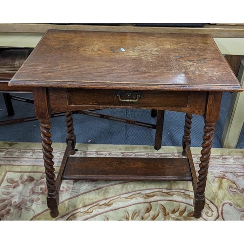 77 - An early 20th century oak side table having a single drawer and barley twist legs, 74.5cmh x 76cmw
L... 