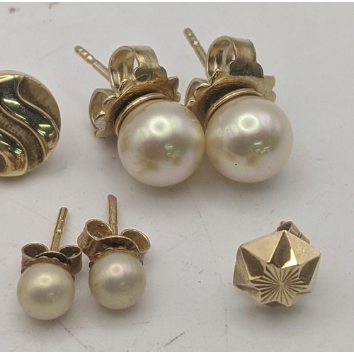 62 - Three pairs of gold earrings all tested as 9ct to include a pair of circle shaped ware design stud e... 