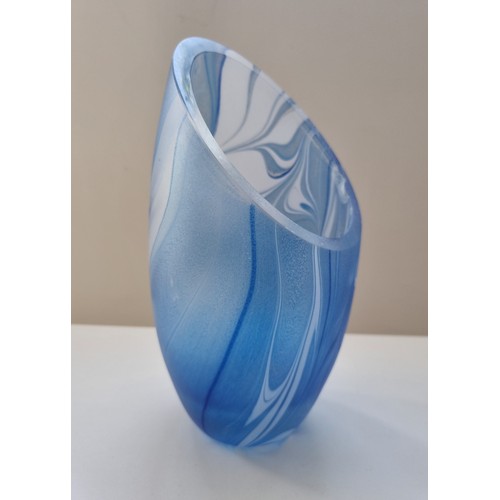 196 - A mixed group of glass to include an Italian mid-century Empoli cased vase decorated with blue glass... 